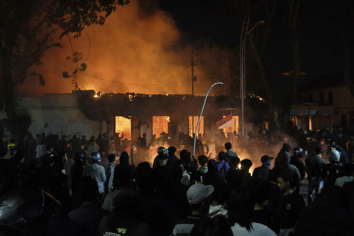 At least 3 dead after mob sets fire to Indonesian regional parliament building