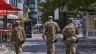 President Trump considers deploying armed National Guard to cities amid criticism