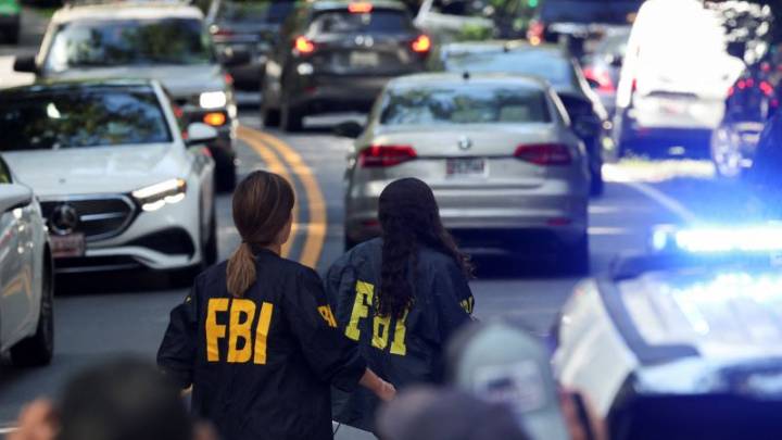 ‘Militarization of politics’: How bucolic Bethesda woke up to FBI raid on John Bolton