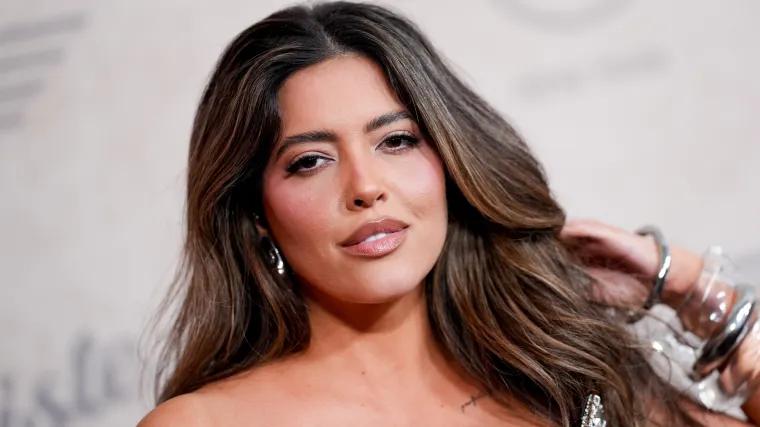 Carefree ‘SI’ Swim model risks teeny bikini to goof off in pool