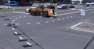 60,000-pound front end loader barrels down hill, crashes after brakes fail