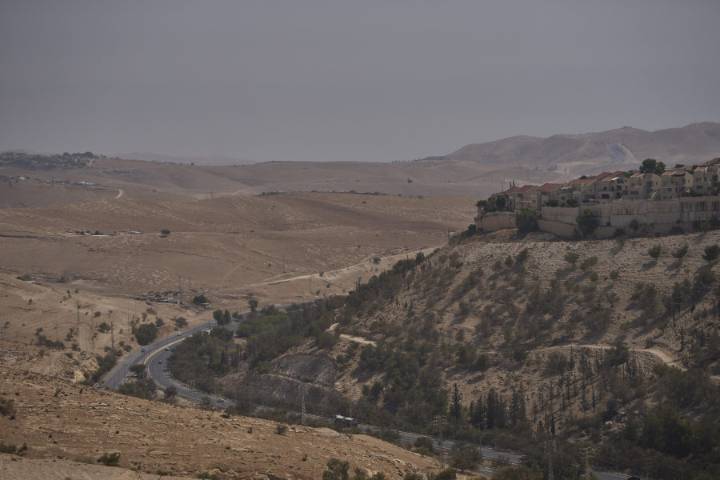 Israel announces a settlement that critics say will effectively sever the West Bank in two Updated 10 mins ago