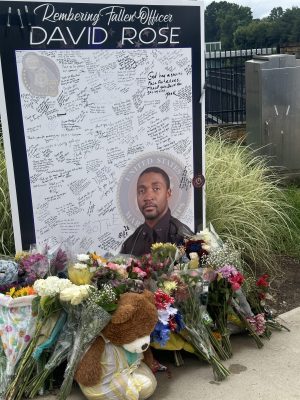CDC supporters gather near scene of shooting, mourners leave flowers