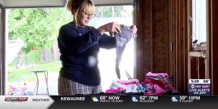 Weyauwega mother collecting clothes to give away to her community