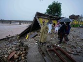 At least 30 people killed in landslide as heavy rains batter northern India