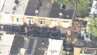 Several rowhomes catch fire in Kensington on Monday