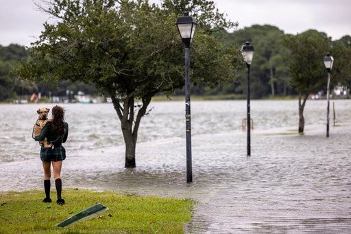 Erin weakens to post-tropical cyclone, moving out to sea as it batters East Coast with wind, waves