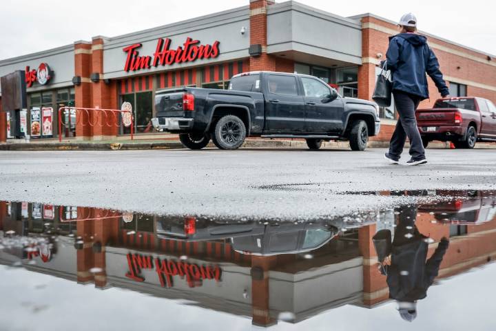 Tim Hortons parent posts lower-than-expected profits for second quarter, beaten back by expenses
