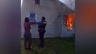 Police Officer Saves Boy Who Jumped Out Second Floor Window Of Burning Home