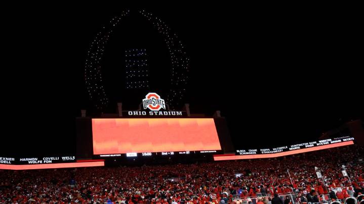 Schools use field logos, higher concession prices and more to pay for the new era in college sports