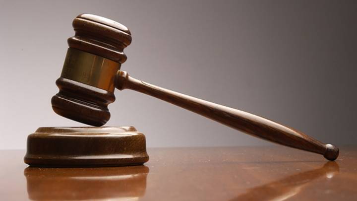 Houston man accused of smuggling 40 migrants using false wall in box truck