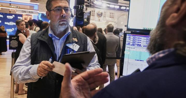 Asian shares are mixed in quiet trading as traders await cues from the Fed