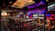Fast Cars and Fancy Cocktails: Philly’s F1 Arcade Is A Fun Pit Stop