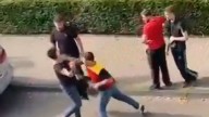 Horror moment DHL driver beats up couple over parking row as brute pulls boxing moves to land brutal string of punches