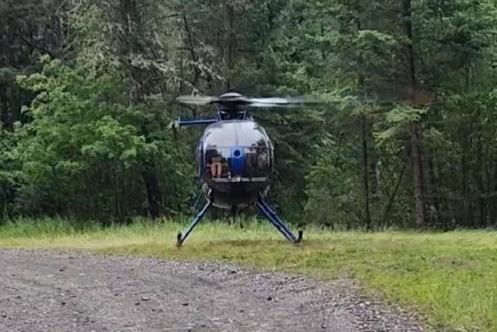 SAR aid in helicopter rescue after East Kootenay bridge washout