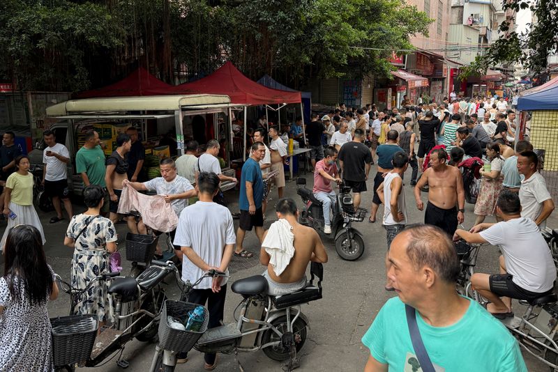 Analysis-China factories cut shifts and workers' pay as US tariffs bite