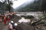 Flash floods kill at least 10 people and leave 33 missing in northwestern China