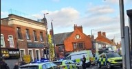 Police issue update after armed cops swoop on bare-chested man in town centre