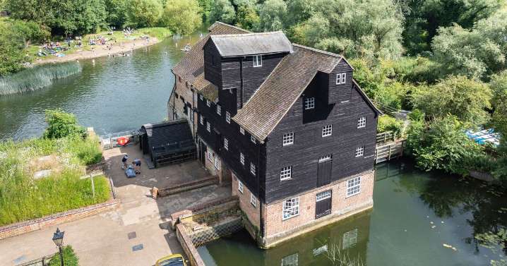 The stunning National Trust mill in an 'idyllic' village with a cute tearoom and beautiful meadows