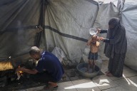 Heat and thirst drive families in Gaza to drink water that makes them sick