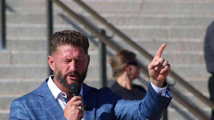 Rallygoers call on Stuart Adams to resign over claims he influenced law to help relative