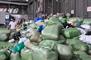 In China’s factory heartland, warehouses weather Trump tariffs