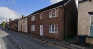 Woman charged with murder after man, 41, found dead at house