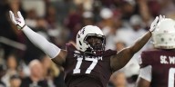 Football and fatherhood: Texas A&M defensive lineman Albert Regis embracing both ‘trenches’