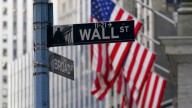 Wall Street holds steadier following mixed profit reports from Target, Lowe's and other retailers