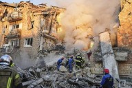Russian attack hits Kyiv center, 18 dead