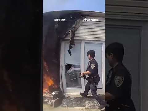 INTO THE FLAMES: Heroic NYPD officers leap into action #shorts #usa #us #viral #new