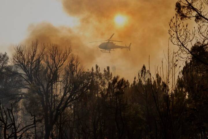 Greece, Spain and Portugal race to contain wildfires as EU steps up cross