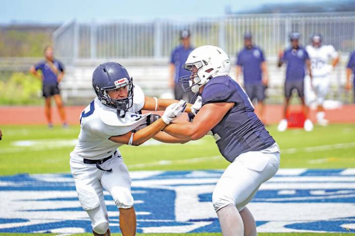 PHOTOS: Warriors battle in Hilo