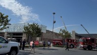 Workers rescued from roof of burning building under construction