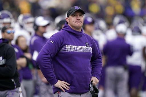 Northwestern reaches settlement with football coach who was fired amid hazing scandal