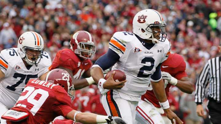 Auburn football announces plans to retire Cam Newton's jersey number