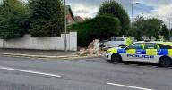 Ayrshire road closed after car hits garden wall