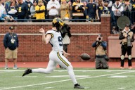 Michigan’s Hudson Hollenbeck is turning every punt into a powerful tribute to his late mother