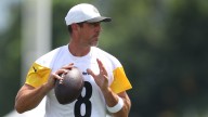 Aaron Rodgers returns to practice with leg wrapped after getting stepped on