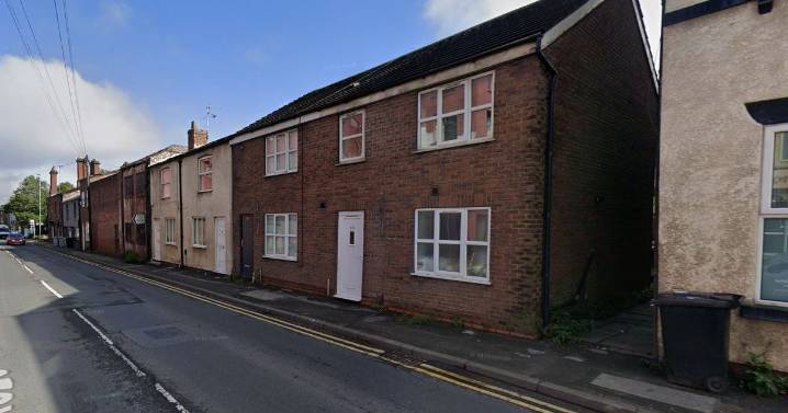 Woman charged with murder after man, 41, found dead at house