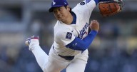 Ohtani gets first victory with Dodgers, striking out season