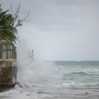 Hurricane Erin intensifies offshore, lashes Caribbean with rain