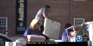 Parents wipe away tears during University of St. Joseph move