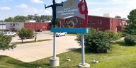 Years after abuse reports, ex-coach at renowned US gymnastics academy is arrested by FBI
