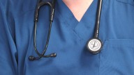 The Uber-driving doctors trapped in a 'cycle of debt'