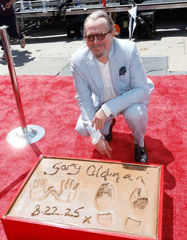 Actor Gary Oldman leaves his prints at TCL Chinese Theatre