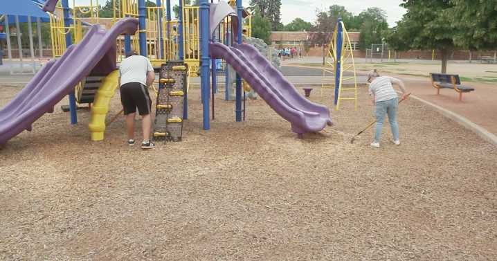 Members of Denver Public Schools Foundation work with partners to clean up campuses before classes begin