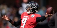 Falcons QB Michael Penix Jr. lands at bottom of pile during joint
