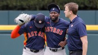 Astros' Taylor Trammell leaves game after crashing into fence