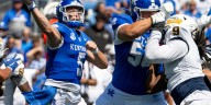 Kentucky escapes Toledo in season opener